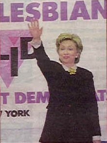    Hillary Rodham Clinton giving HIEL sign at a Gay Lesbian meeting.   