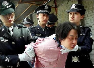 A Chinese woman is about to be executed in THE DEATH VAN!